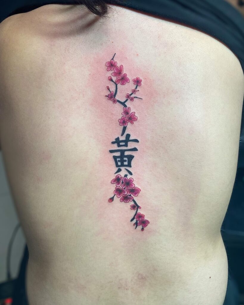 Cherry Blossom Spine Tattoo with Japanese Characters Tattoo Design