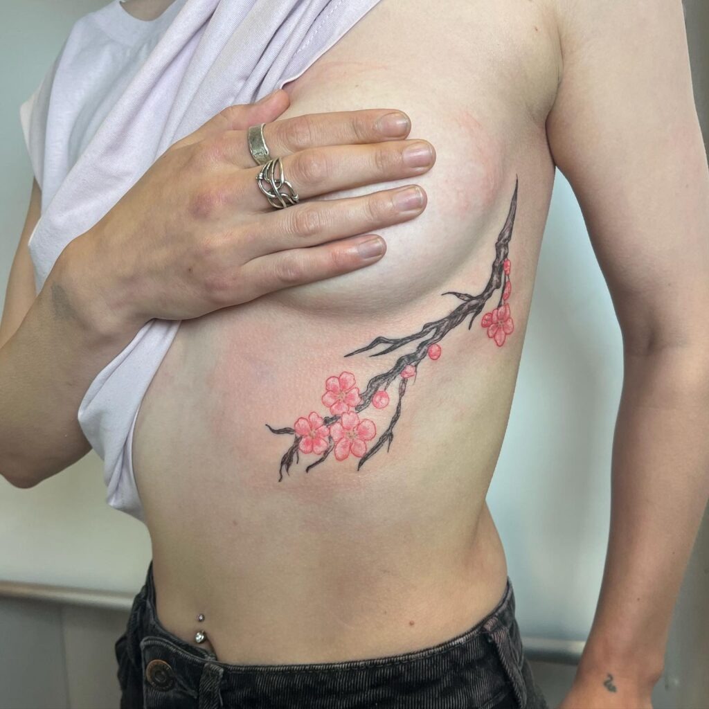 Minimal Cherry Blossom Rib Tattoo Tattoo Design