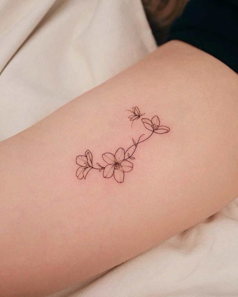 Minimalist Cherry Blossom and Butterfly Tattoo Tattoo Design