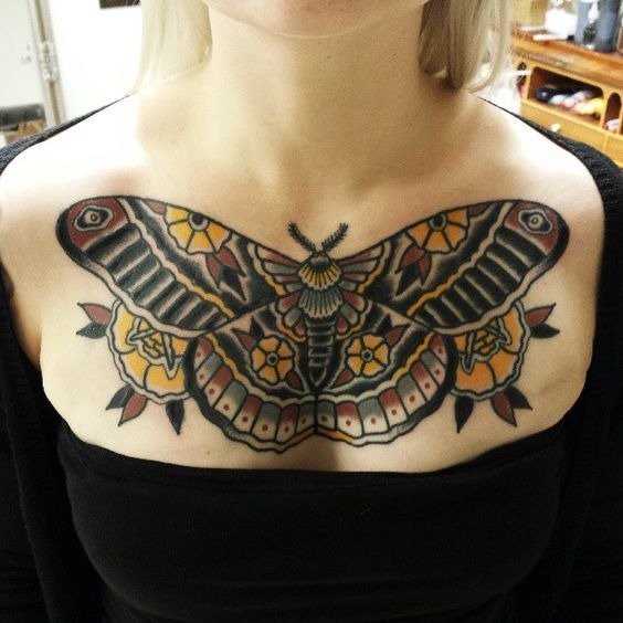 Tattoos for Women: Yellow Brown and Black Chest Tattoo Tattoo Design