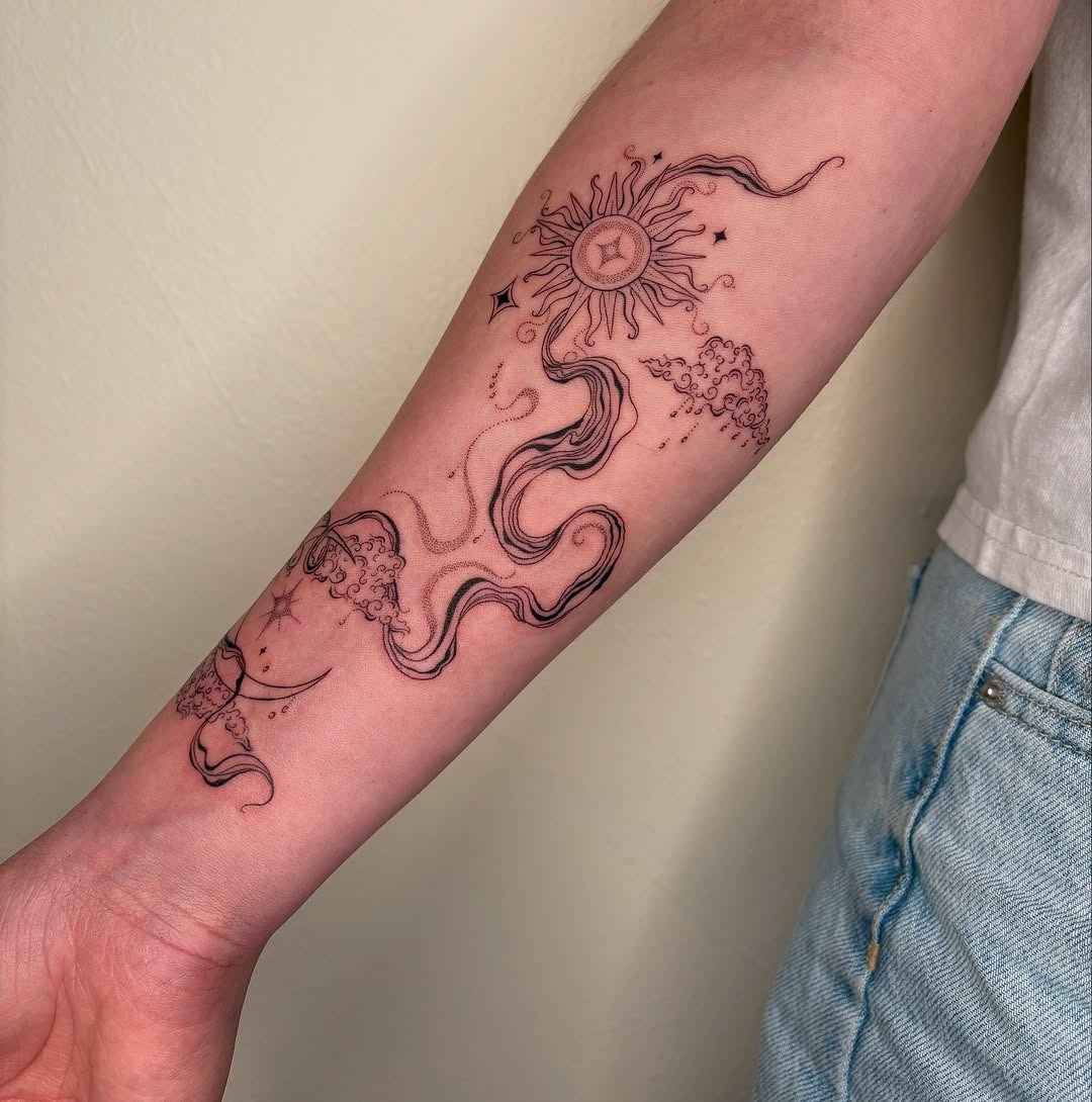 Elegant cloud and sun forearm tattoo design Tattoo Design