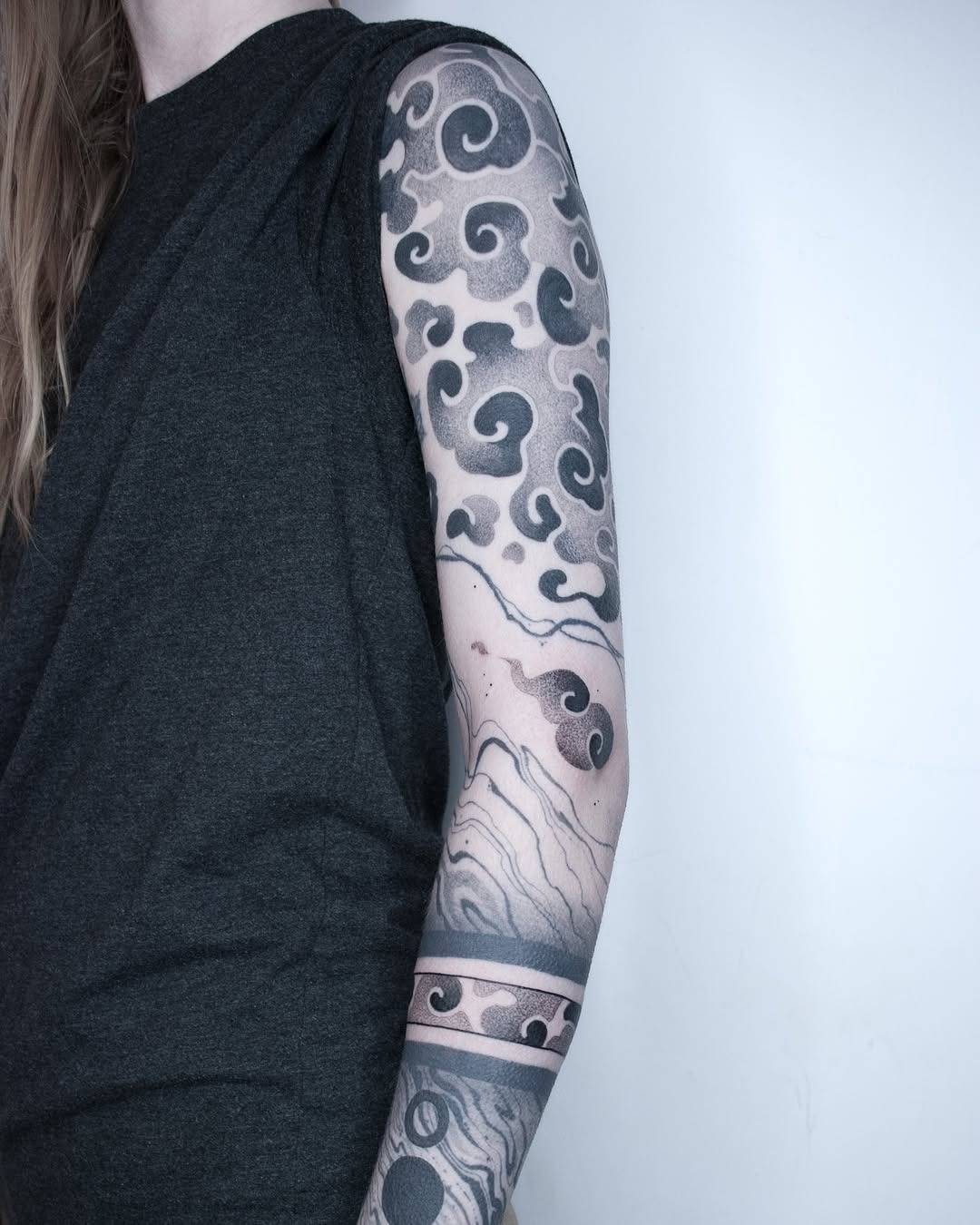 Elegant cloud tattoos with intricate details Tattoo Design
