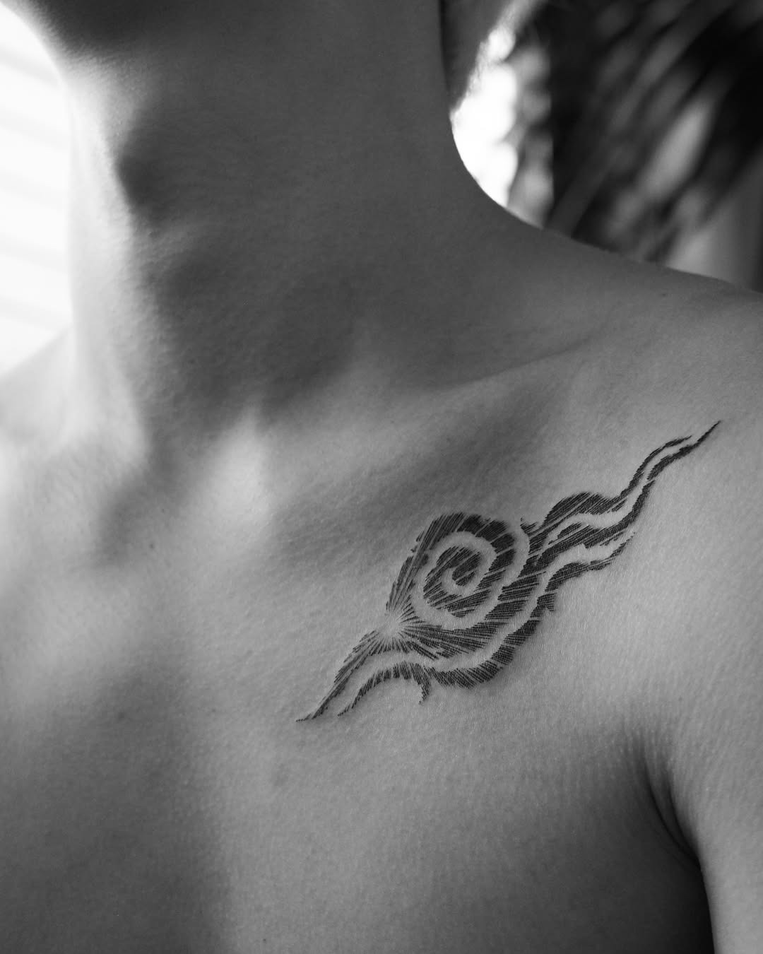 Elegant swirl cloud tattoo on shoulder area Tattoo Design