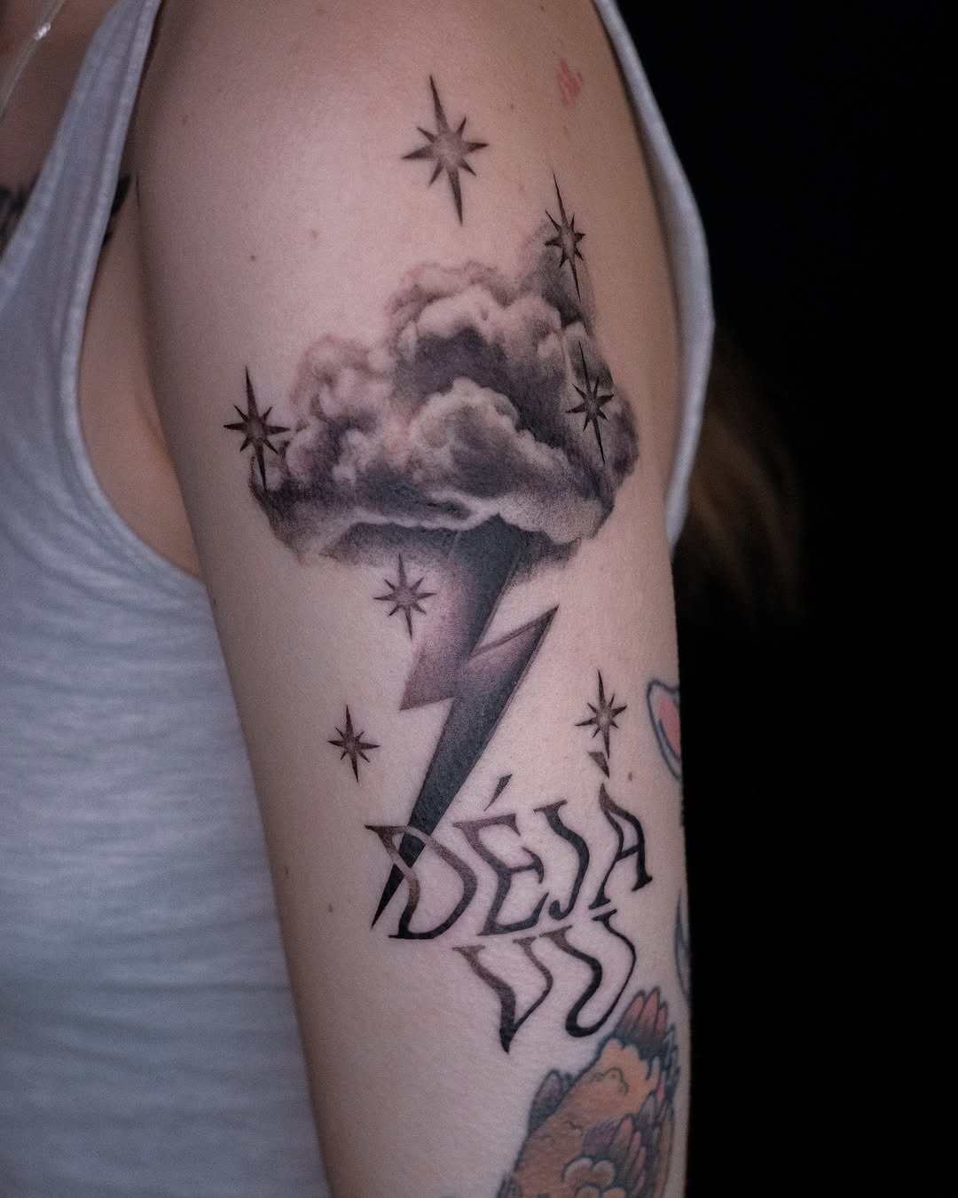 Striking cloud tattoo with lightning and stars Tattoo Design