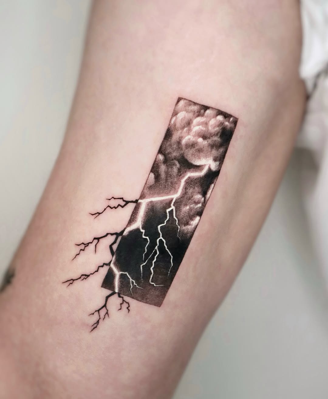 Stunning realistic cloud and lightning tattoo design Tattoo Design