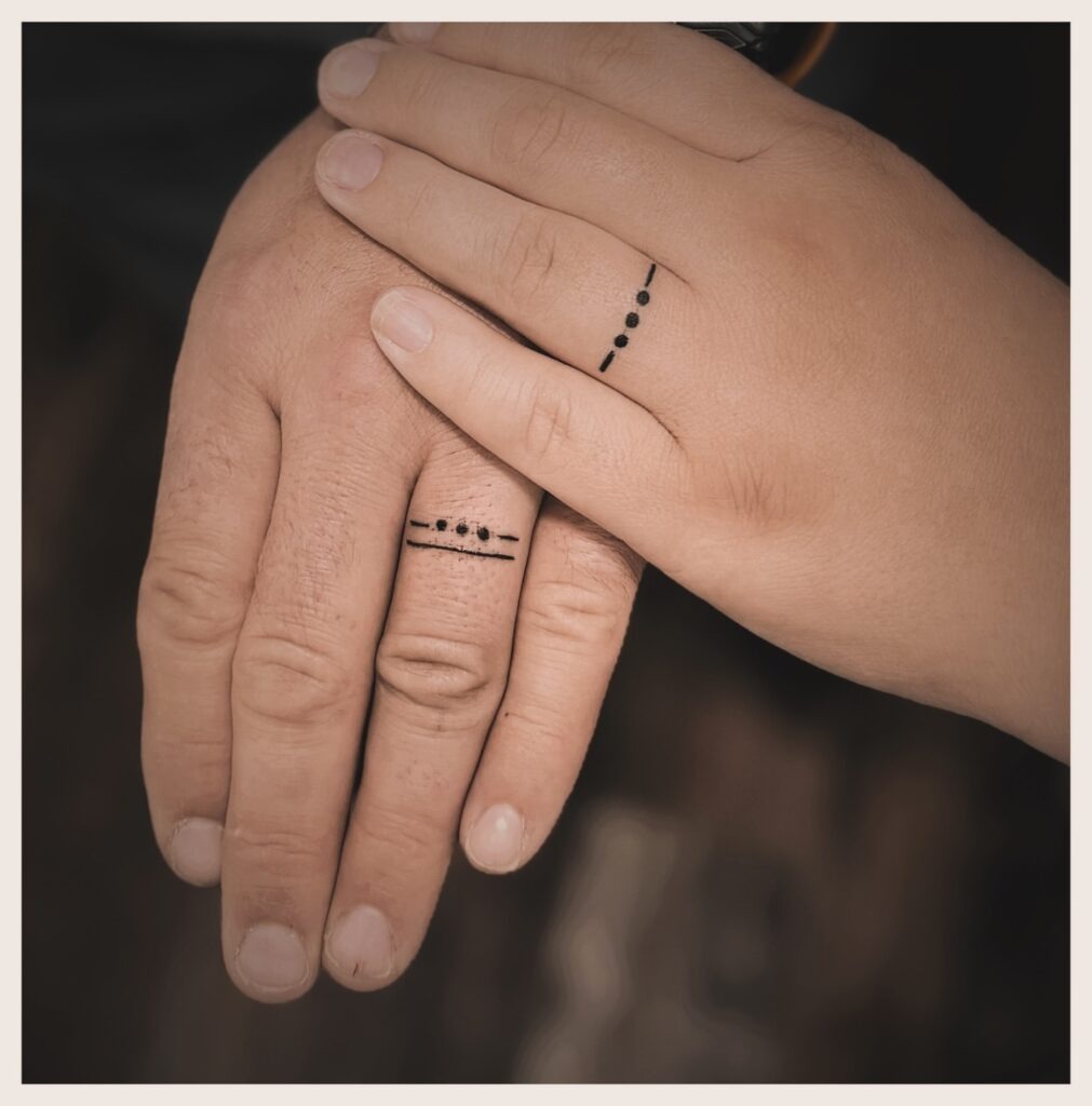 Vines Encircling Ring Fingers Tattoo Design