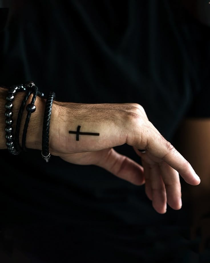 Minimalist Hand Cross Tattoo Tattoo Design