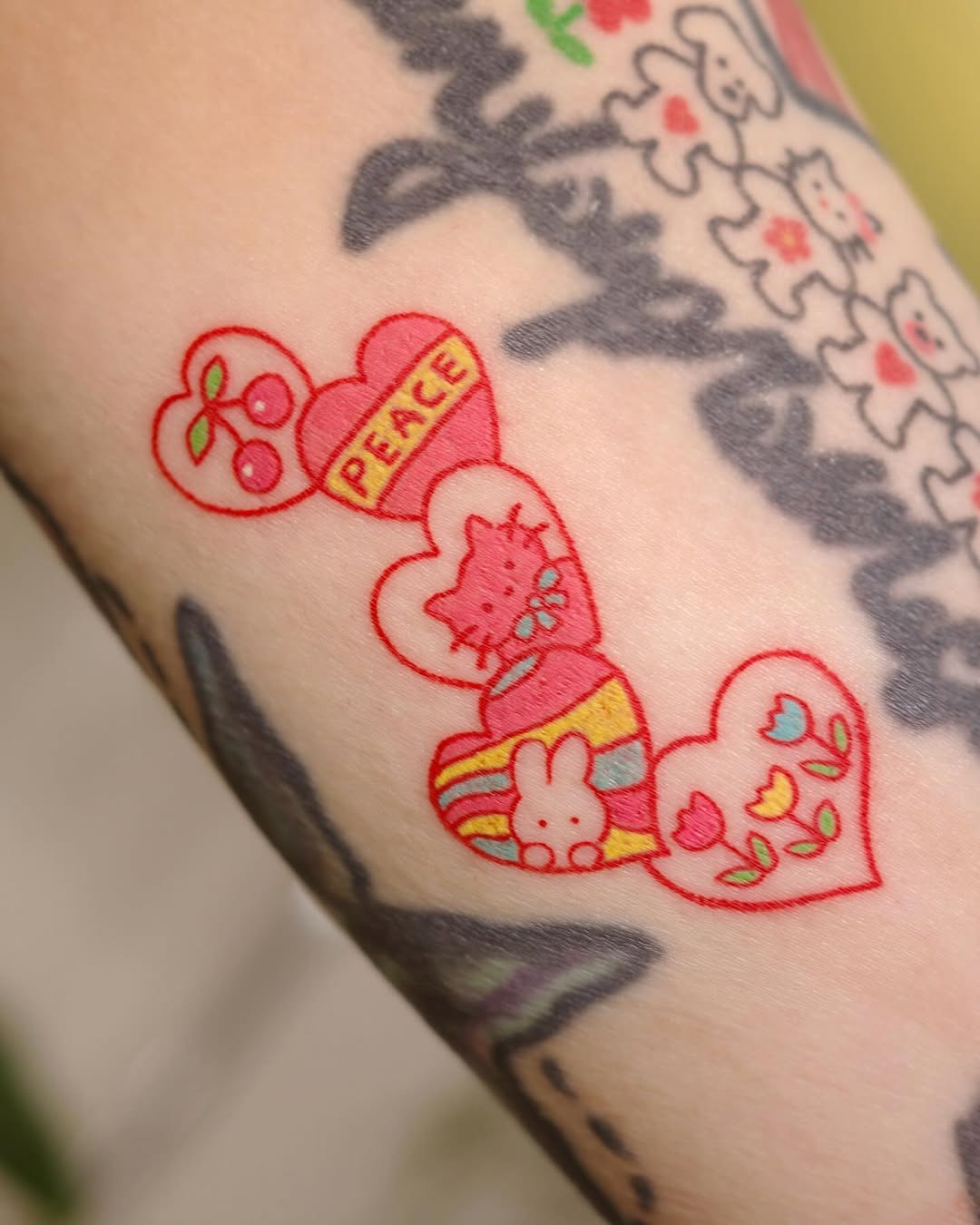 Adorable hearts featuring cherry and peace symbols Tattoo Design