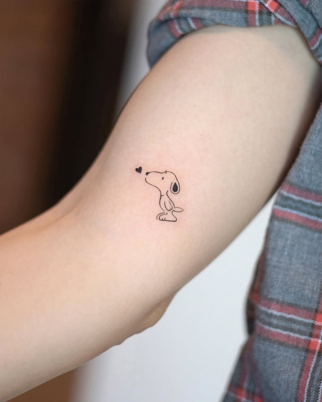 Adorable Snoopy Tattoo with Heart Detail Tattoo Design