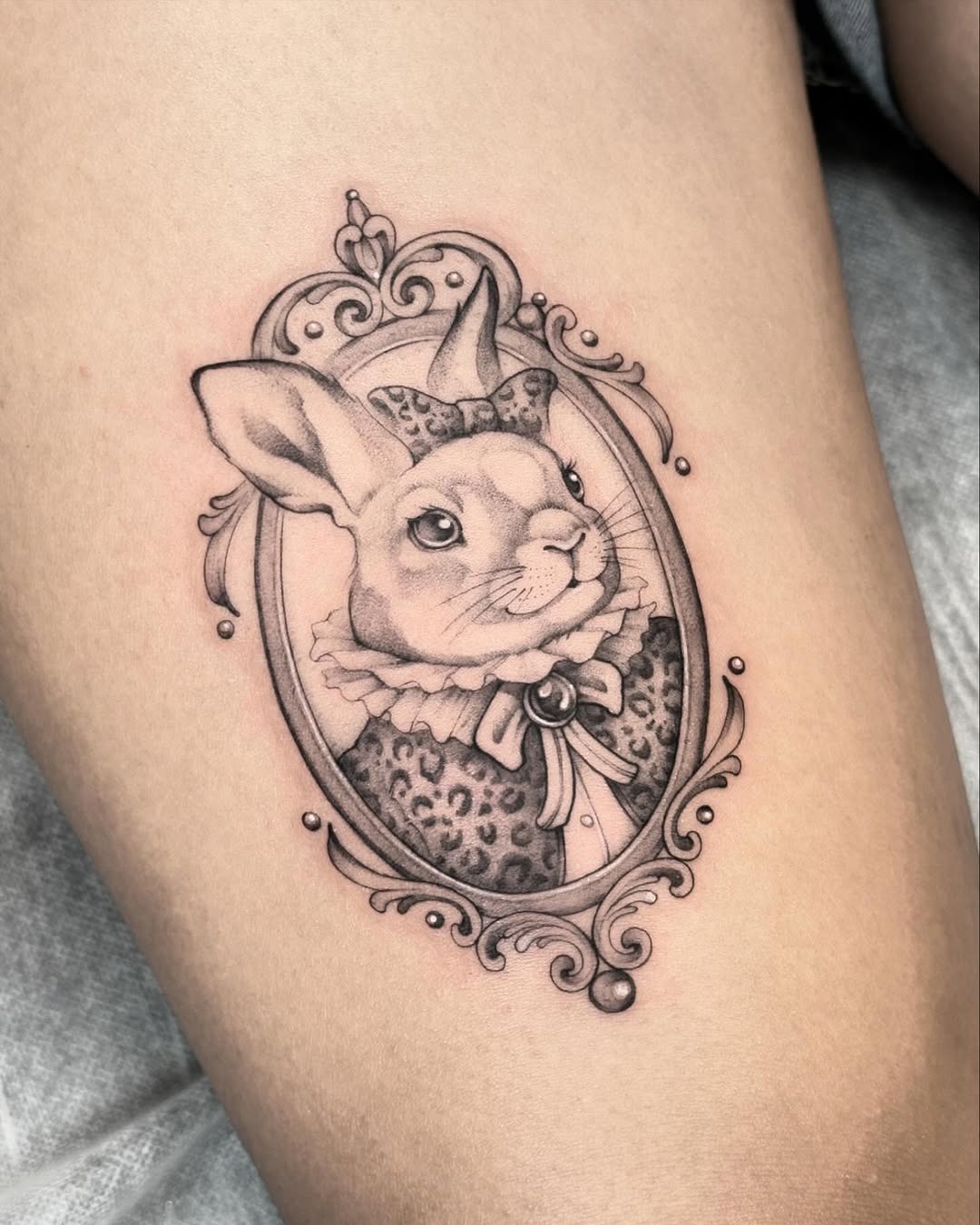 Charming bunny tattoo in ornate frame Tattoo Design