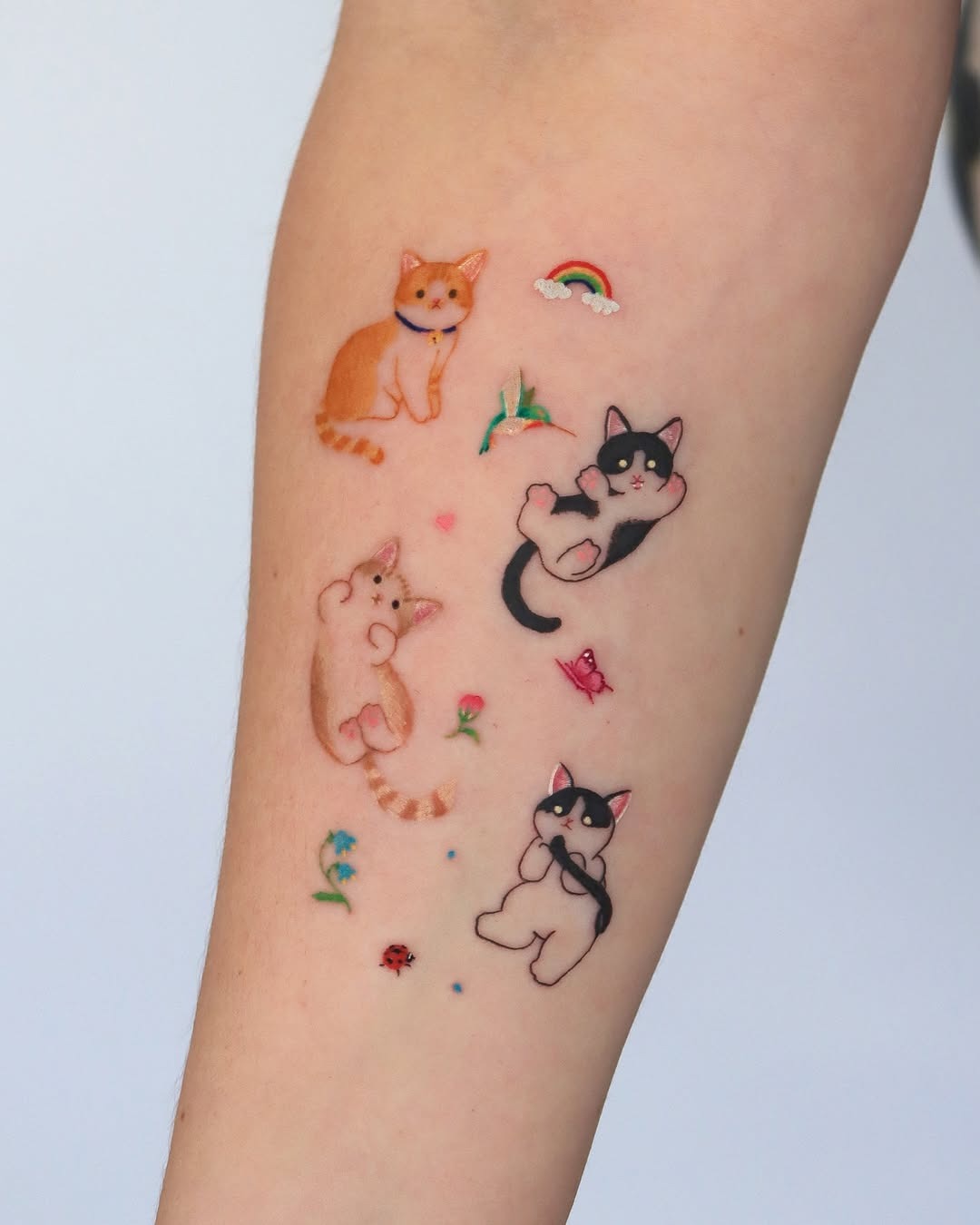 Charming cats in vibrant ink expressions Tattoo Design