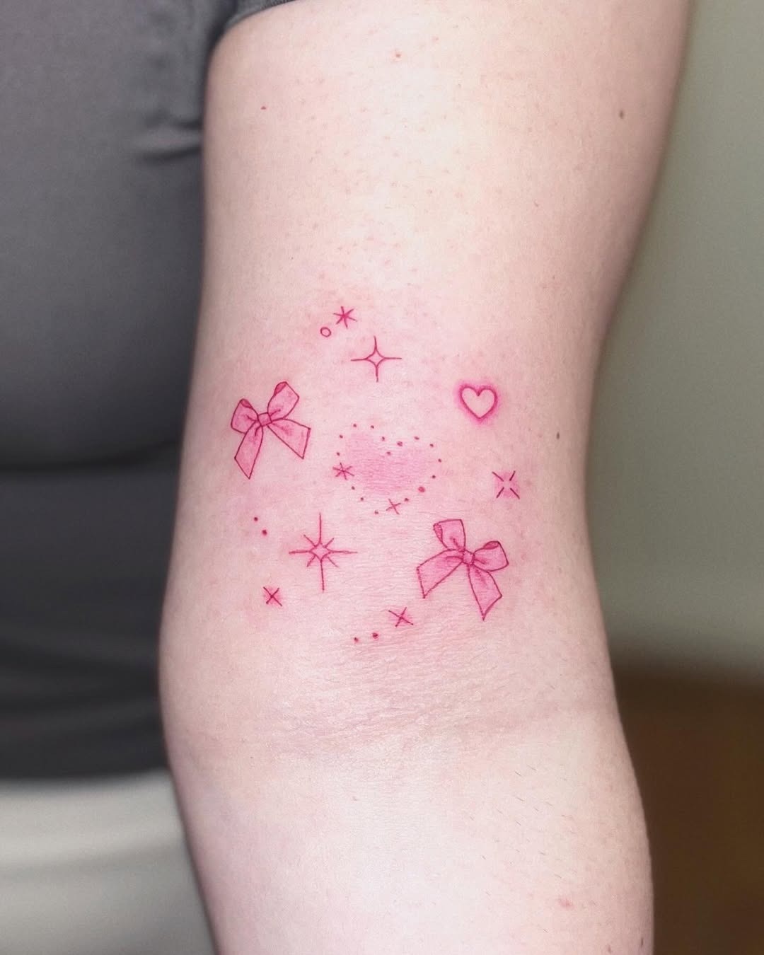 Delicate pink bows with sparkling stars and heart Tattoo Design