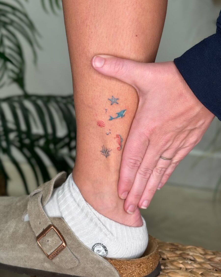 Charming aquatic-themed dainty tattoos for the ankle Tattoo Design