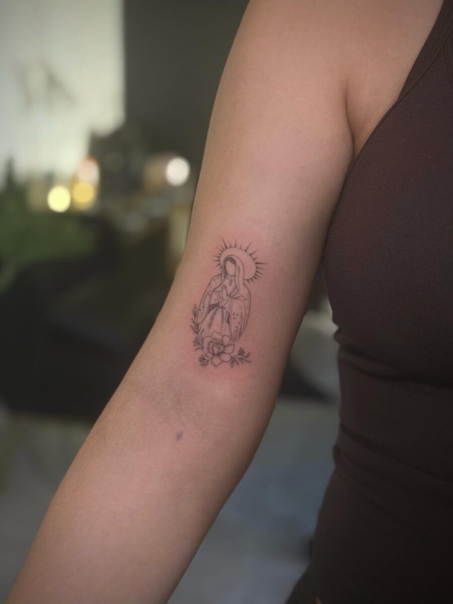 Elegant Dainty Tattoo of a Female Figure Tattoo Design