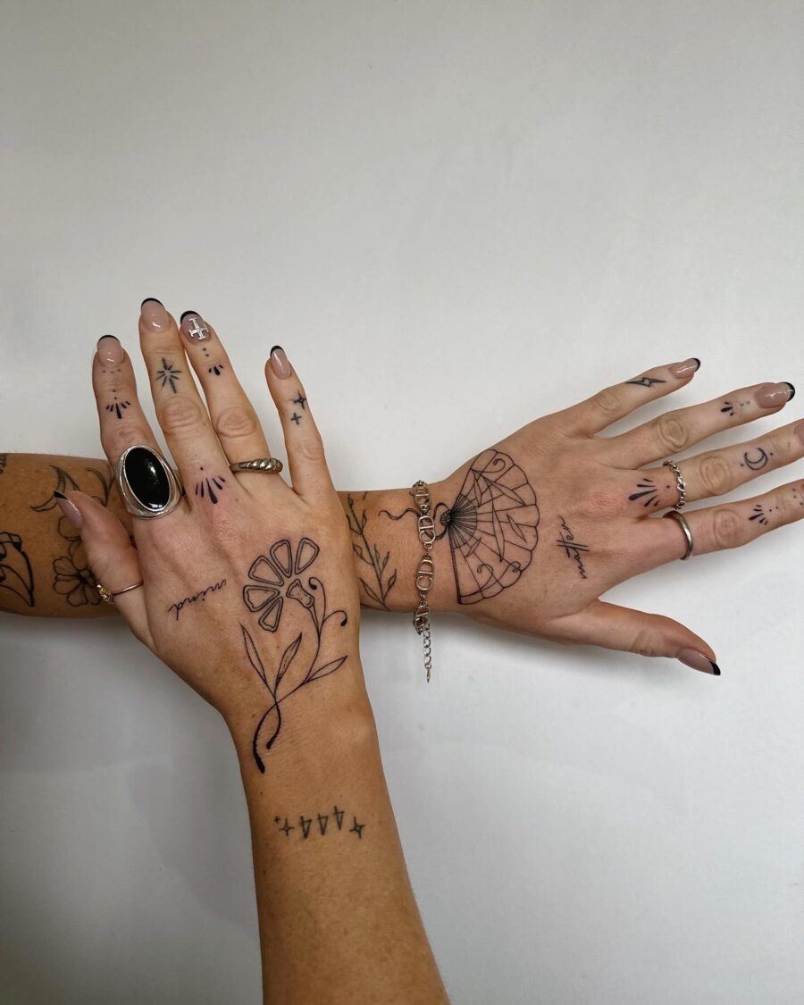 Elegant display of dainty hand tattoos Tattoo Design