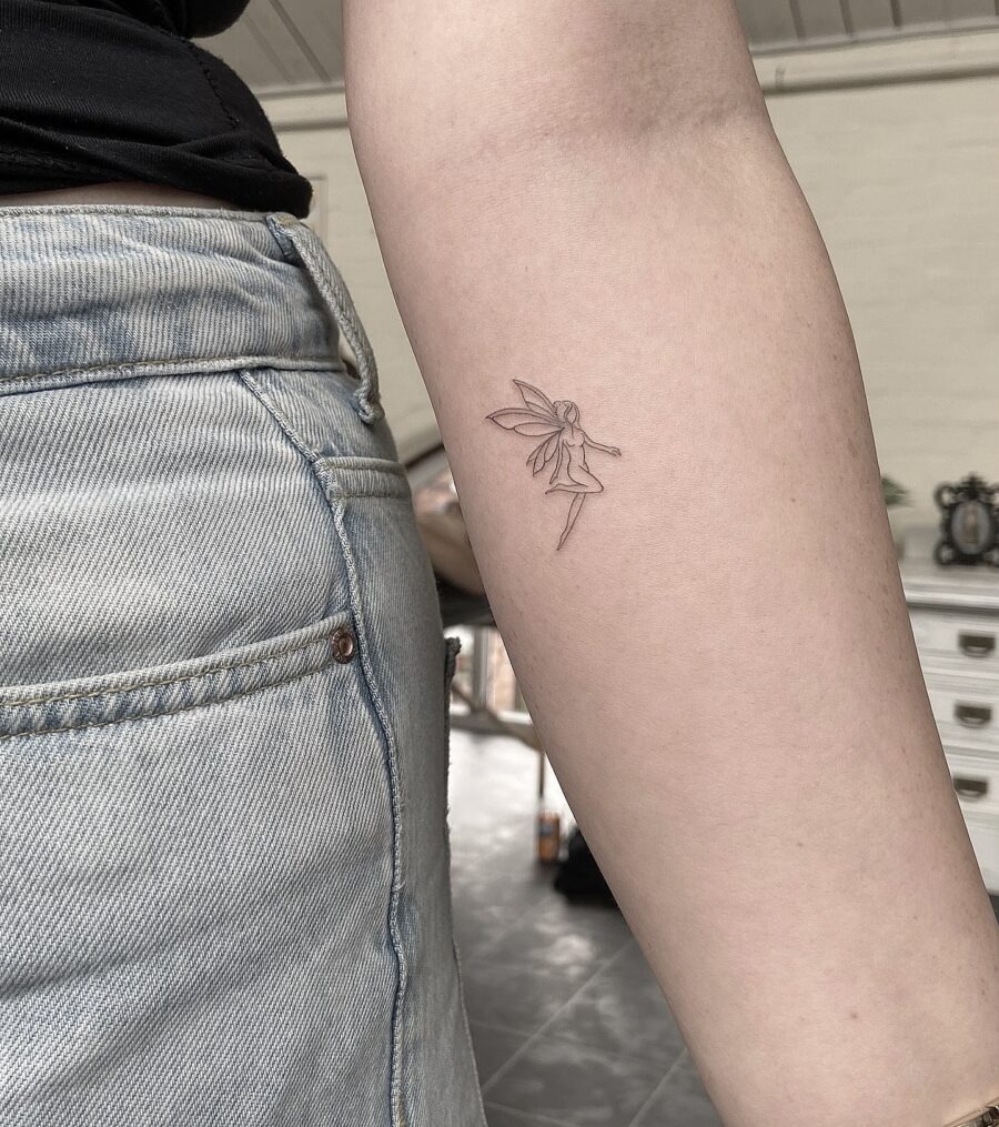 Elegant fairy tattoo on delicate skin Tattoo Design
