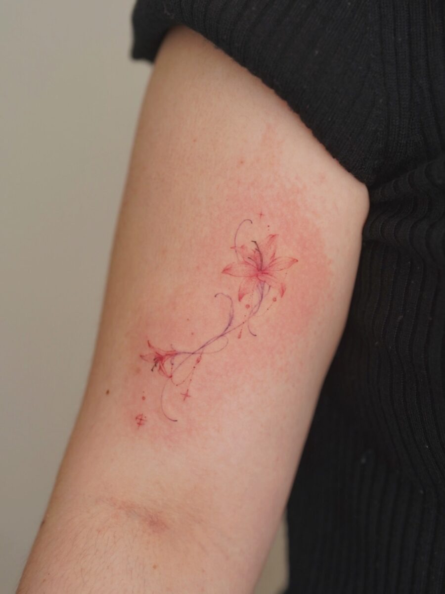 Elegant floral design in soft pink tones Tattoo Design