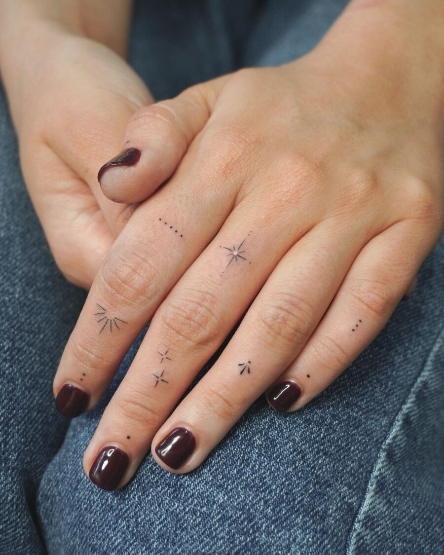 Elegant hand tattoos with minimalist star designs Tattoo Design