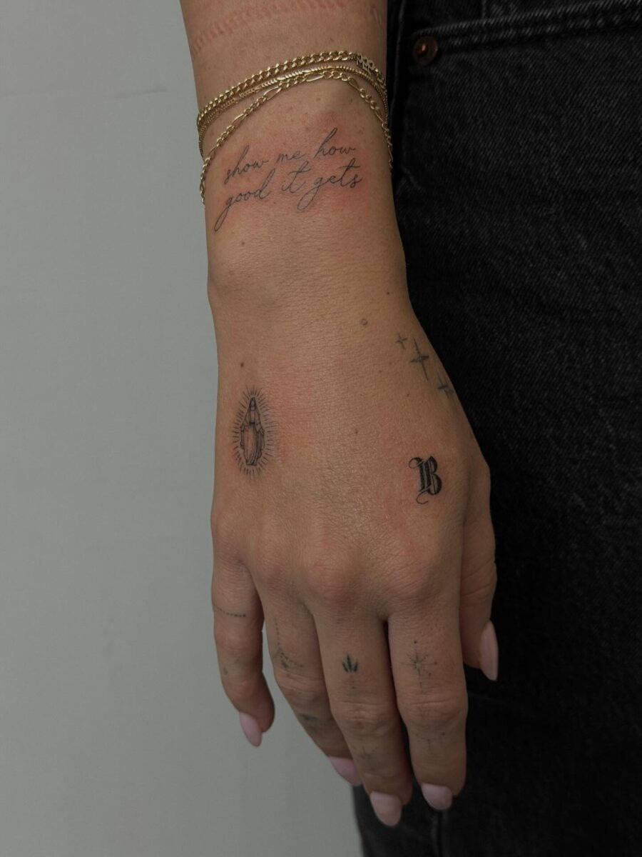 Elegant handcrafted tattoos on a delicate wrist. Tattoo Design