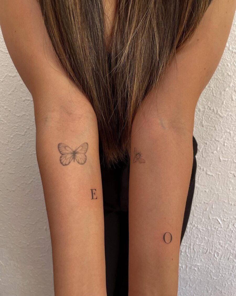 Elegant Tattoos Featuring Butterfly and Initials Tattoo Design