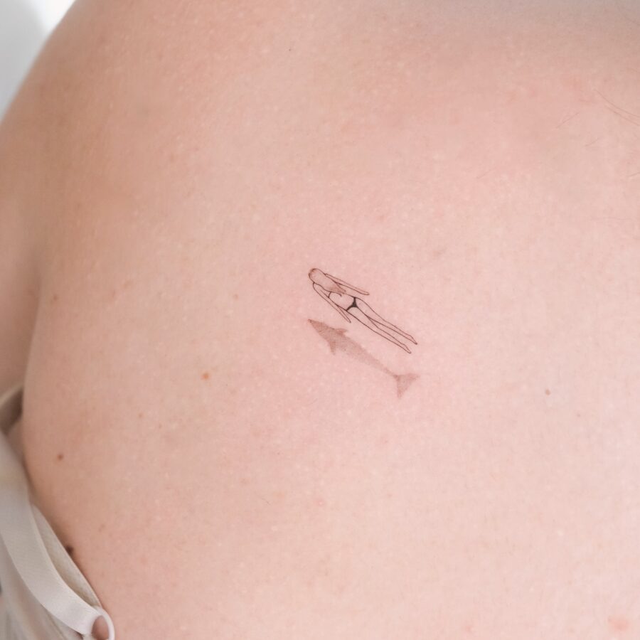 Minimalist silhouette tattoo on bare skin Tattoo Design