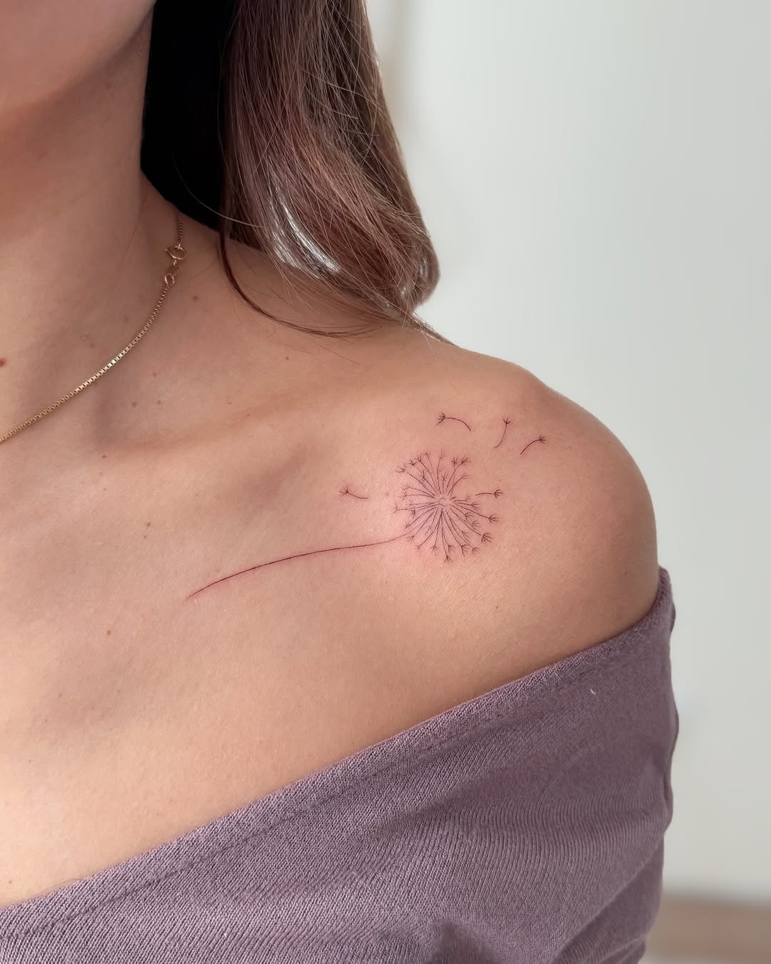 Delicate dandelion tattoo on the shoulder Tattoo Design