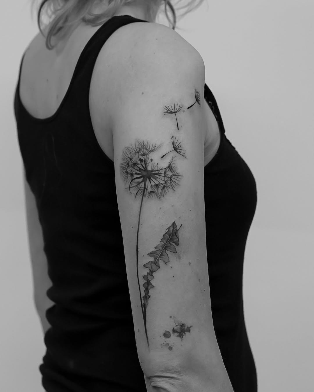 Elegant black and white dandelion tattoo design Tattoo Design