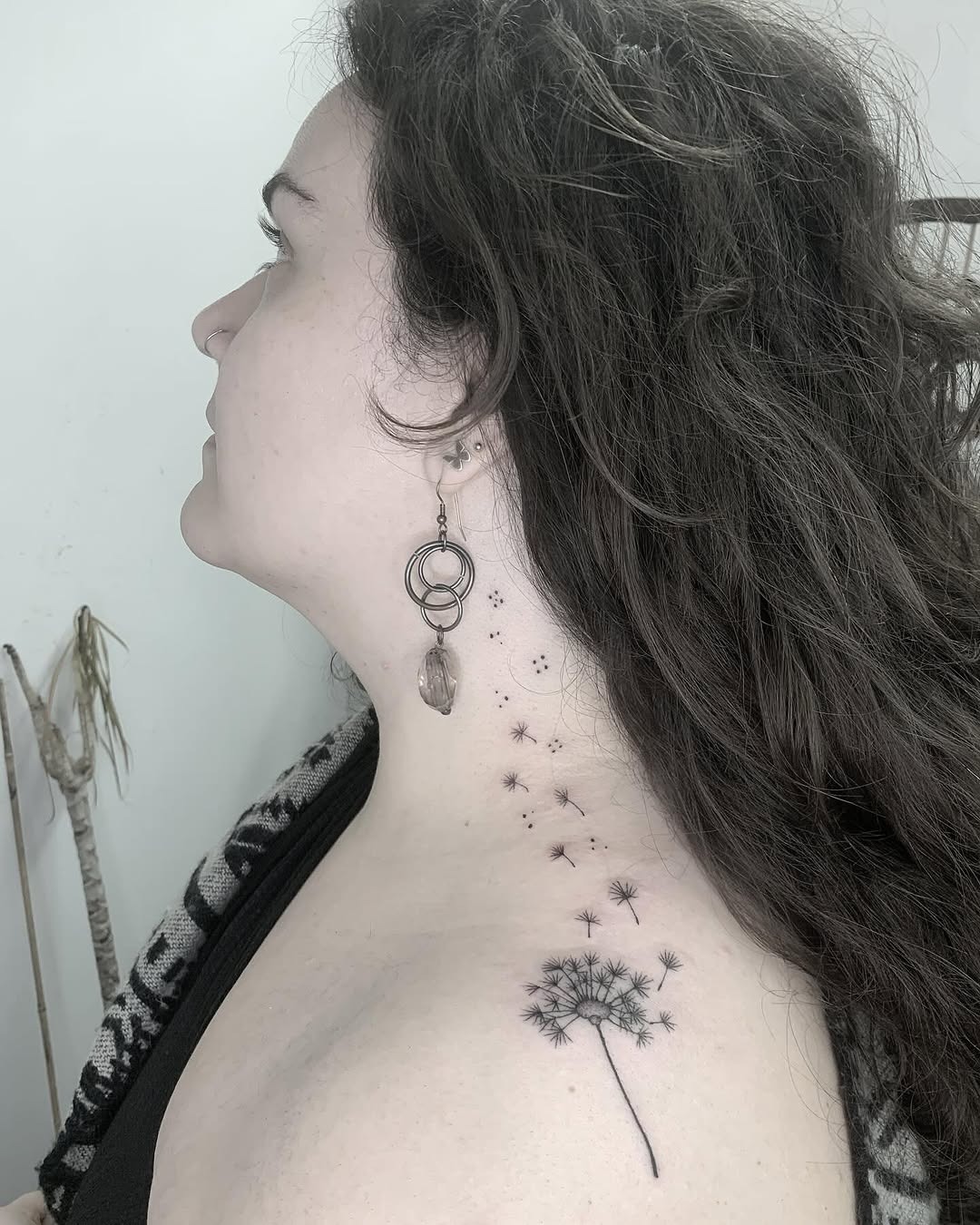 Elegant dandelion tattoo cascading down the neck Tattoo Design