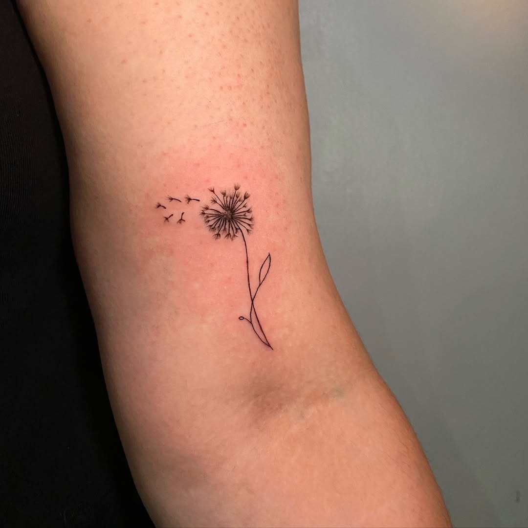 Minimalist Dandelion Tattoo with Floating Seeds Tattoo Design