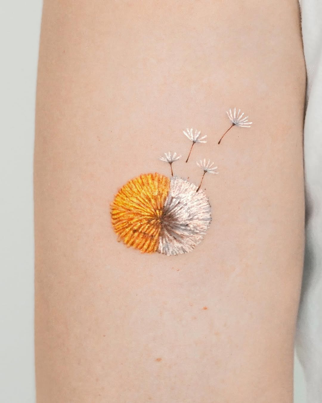 Stunning embroidered dandelion tattoo design Tattoo Design