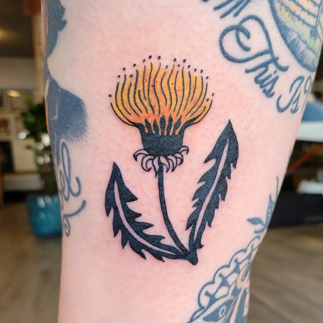 Vibrant dandelion tattoo with intricate detailing Tattoo Design