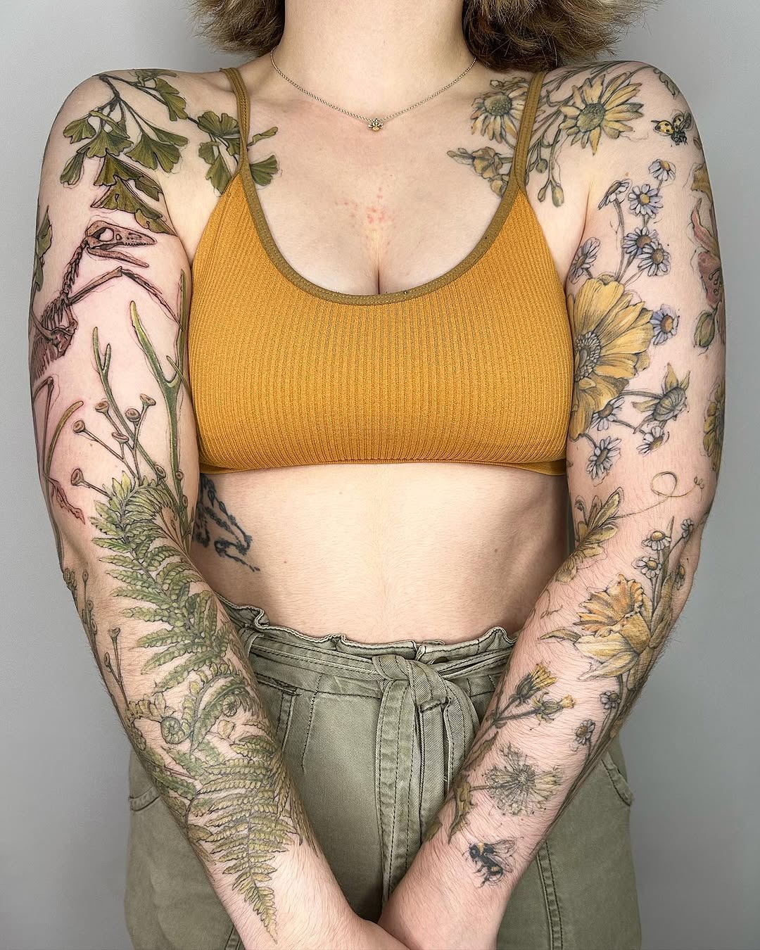 Whimsical dandelion tattoo with nature motifs Tattoo Design