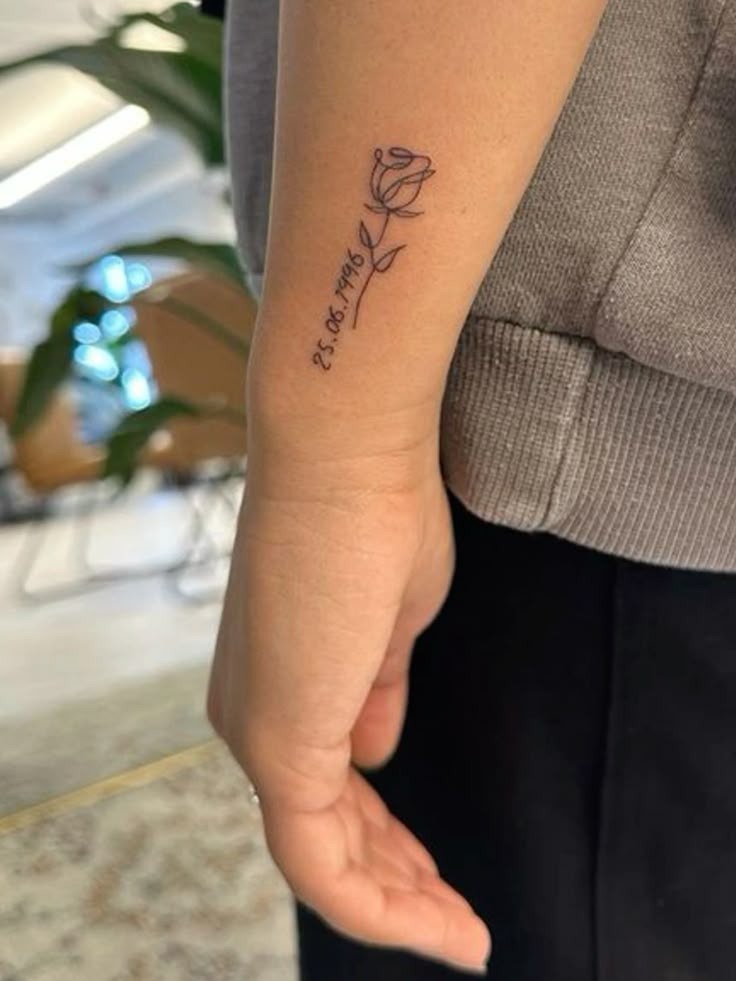 Rose Stem Date Tattoo on the Wrist Tattoo Design
