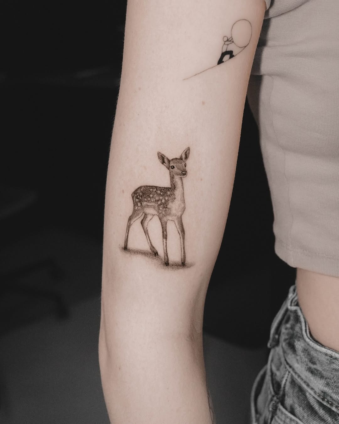 Charming realistic small deer tattoo on arm Tattoo Design