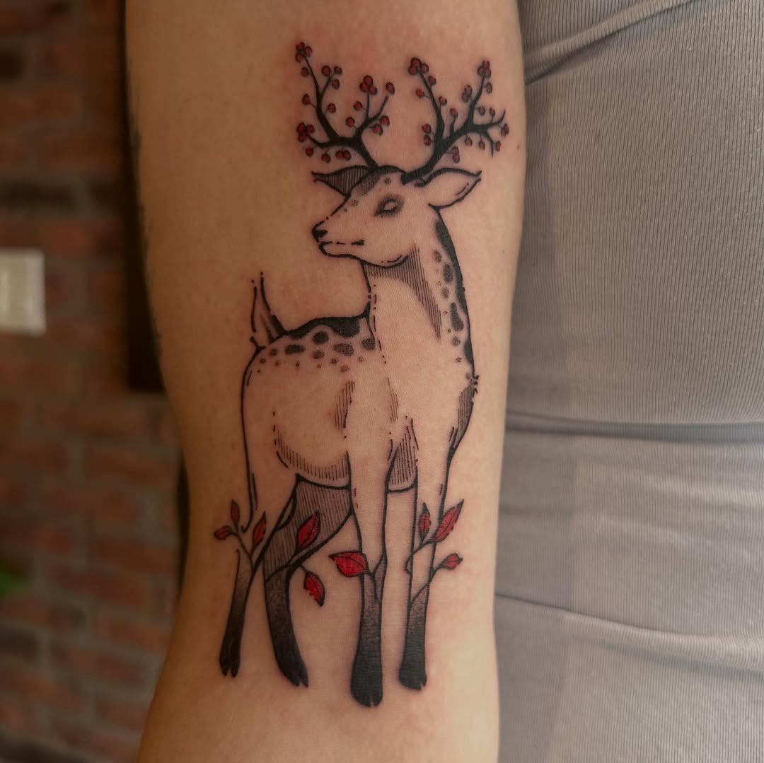 Elegant deer tattoo surrounded by floral elements Tattoo Design