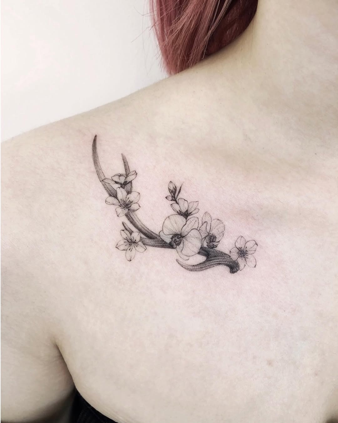 Elegant deer tattoo with floral accents Tattoo Design