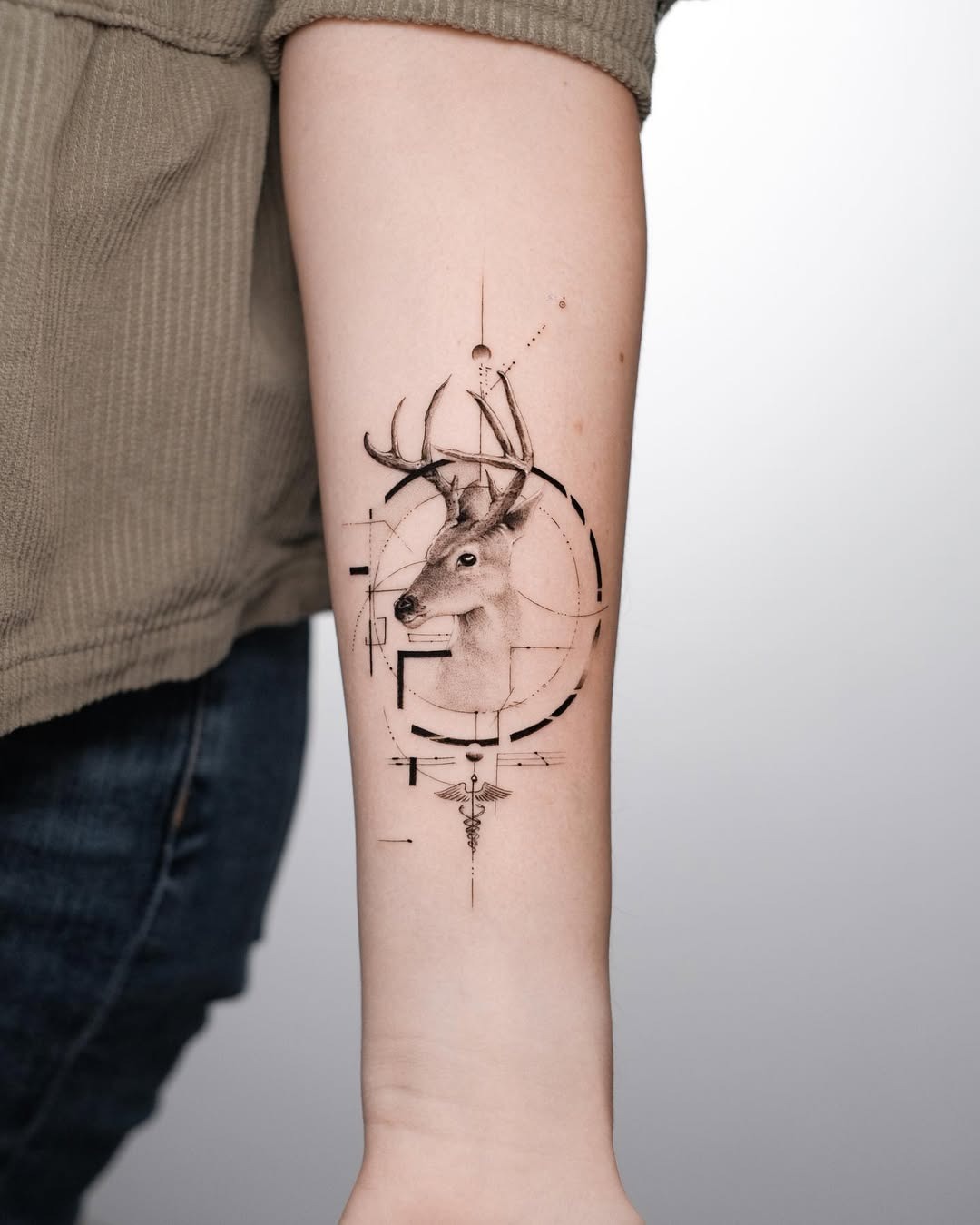Elegant geometric deer tattoo with fine lines Tattoo Design