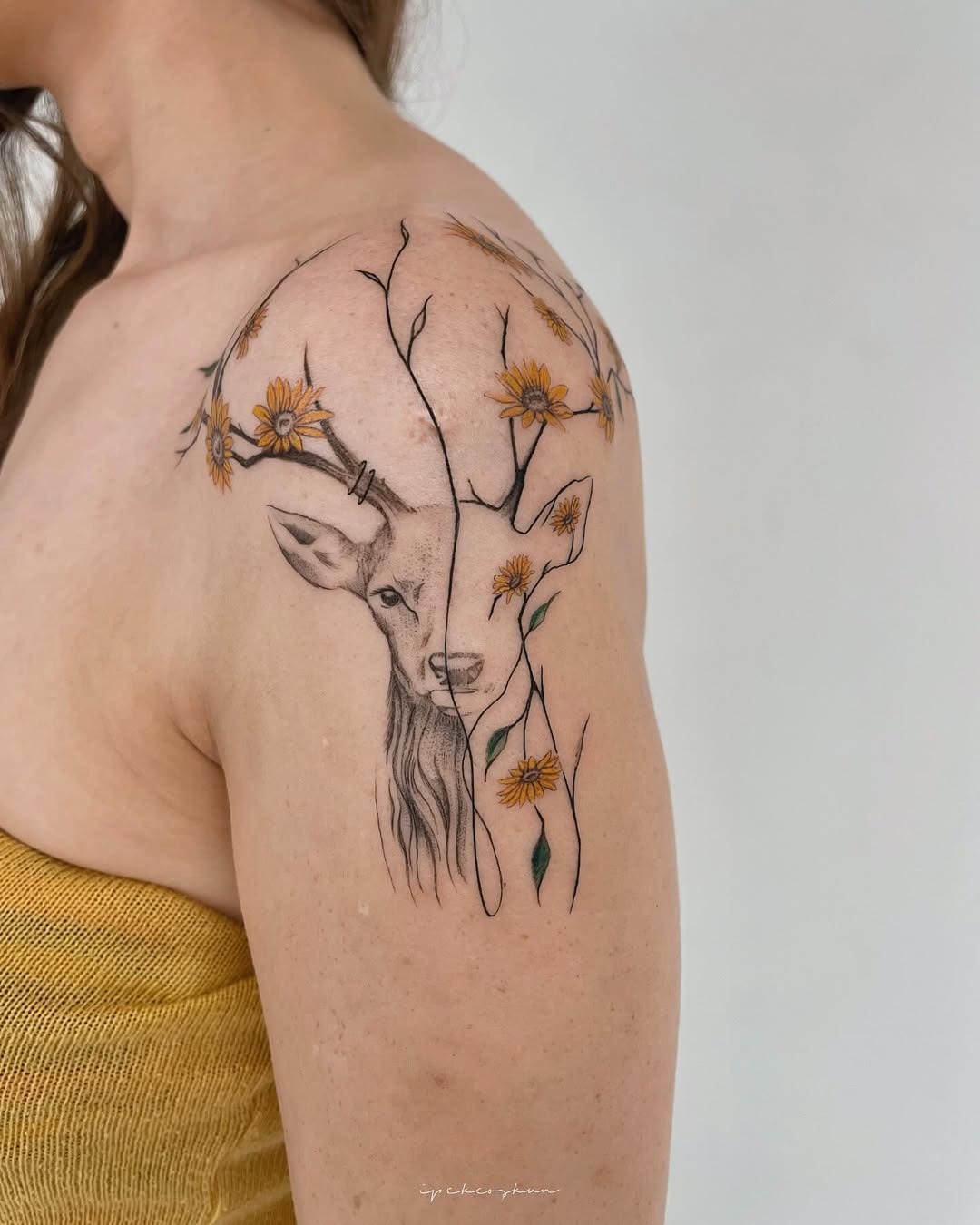 Feminine deer tattoo with beautiful floral elements Tattoo Design