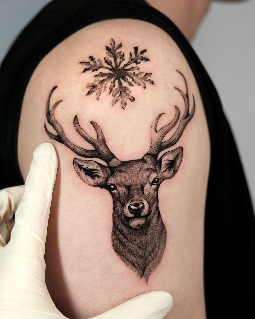 Majestic deer with a snowflake design Tattoo Design