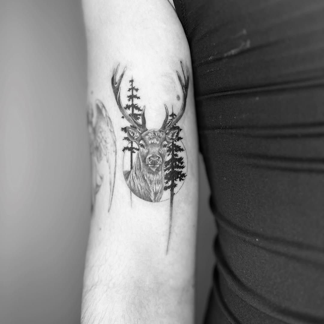 Majestic stag tattoo with forest backdrop Tattoo Design