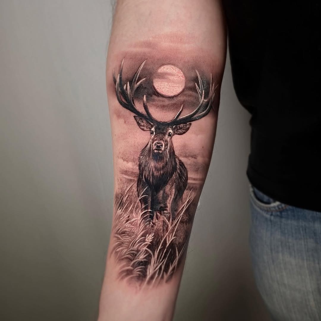 Majestic stag under a glowing full moon Tattoo Design