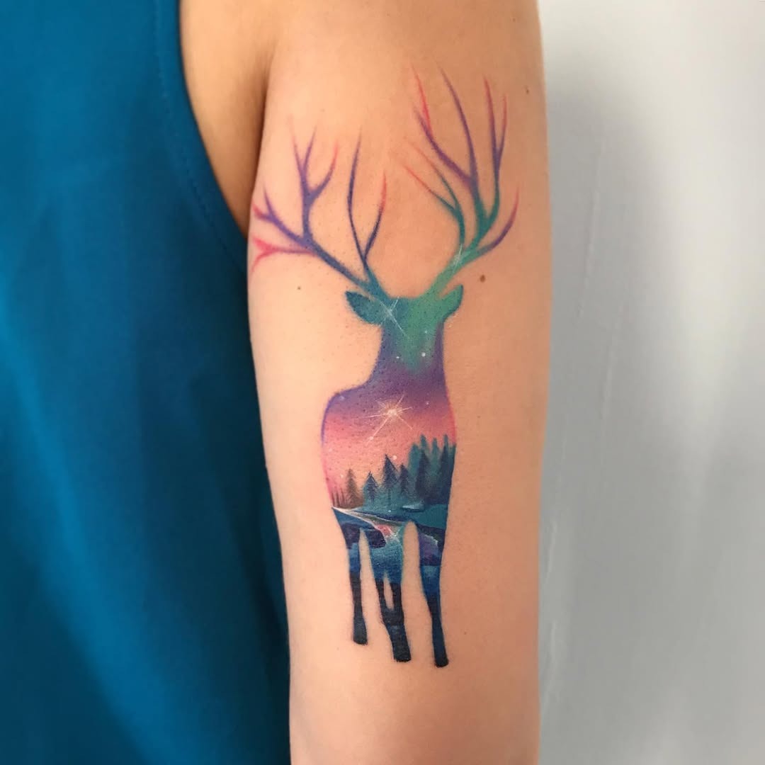 Vibrant stag inked with starry scenery Tattoo Design