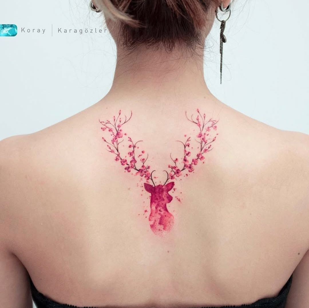 Vibrant watercolor deer tattoo with floral antlers Tattoo Design
