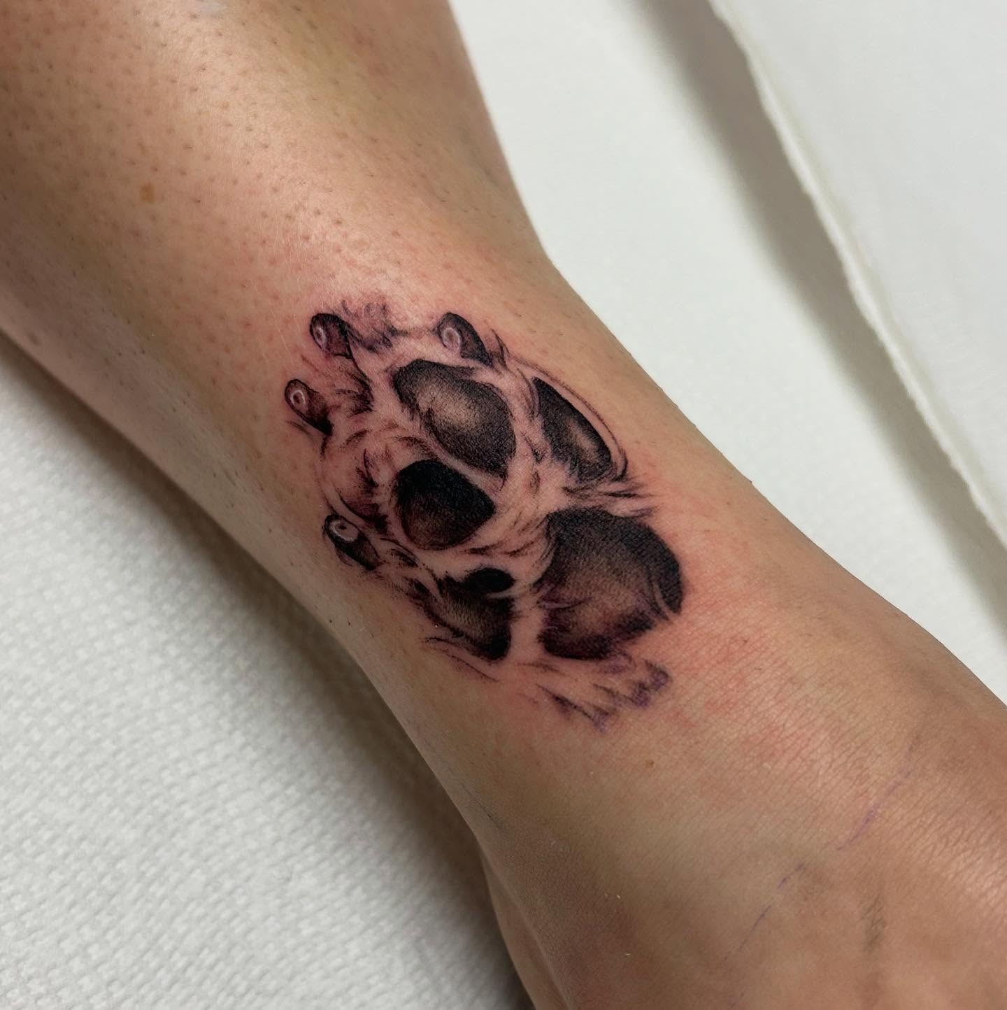 Furry Dog Paw Tattoo With Tiny Claws Tattoo Design