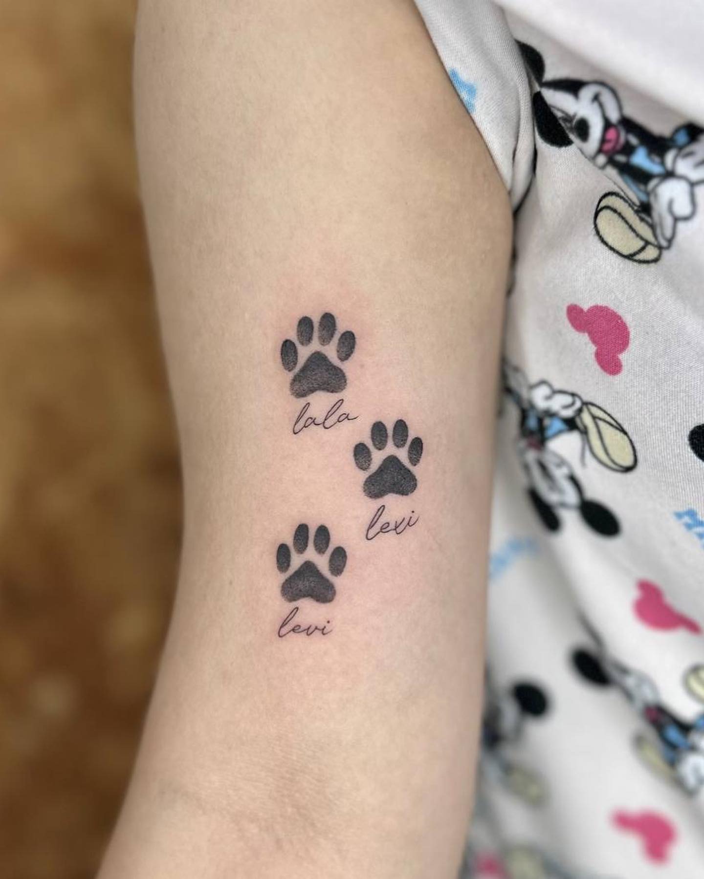 Tiny Dog Paw and Name Tattoo Tattoo Design