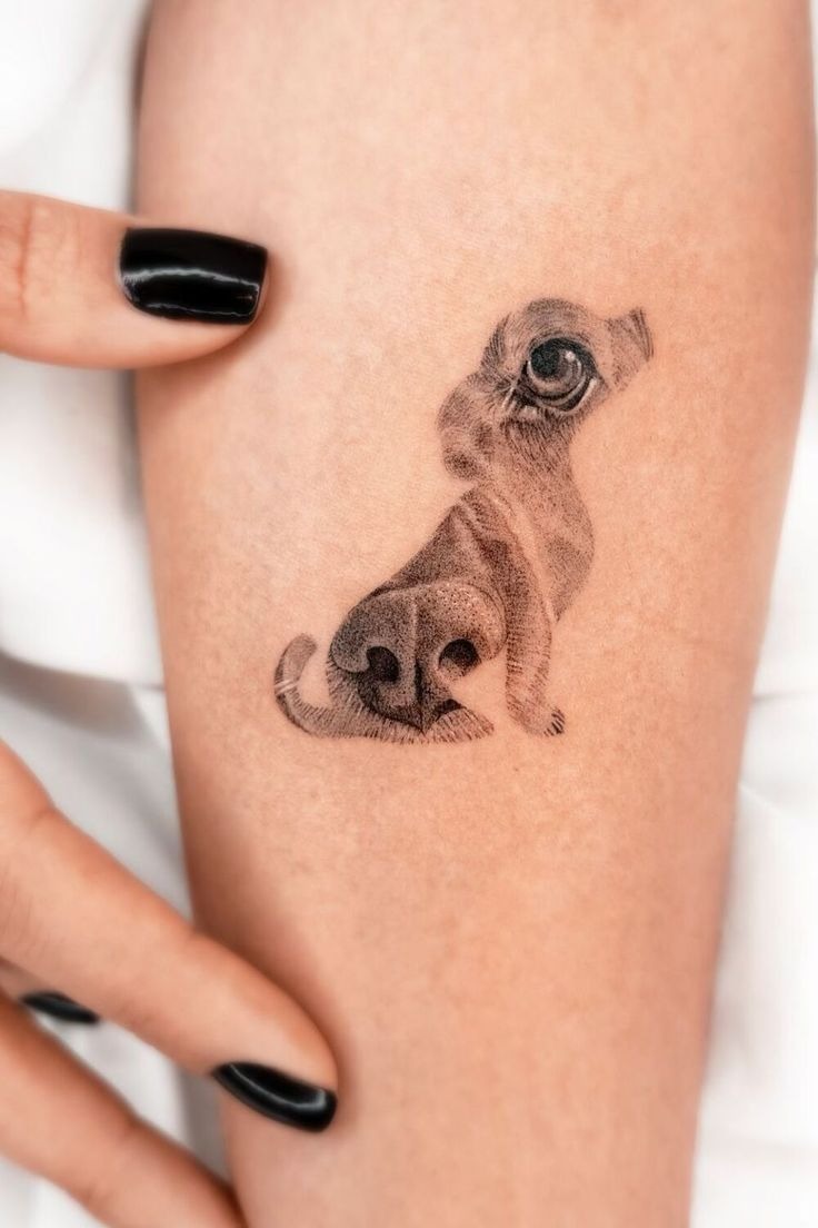 Shaped by Love: Nose and Eye Dog Silhouette Tattoo Design
