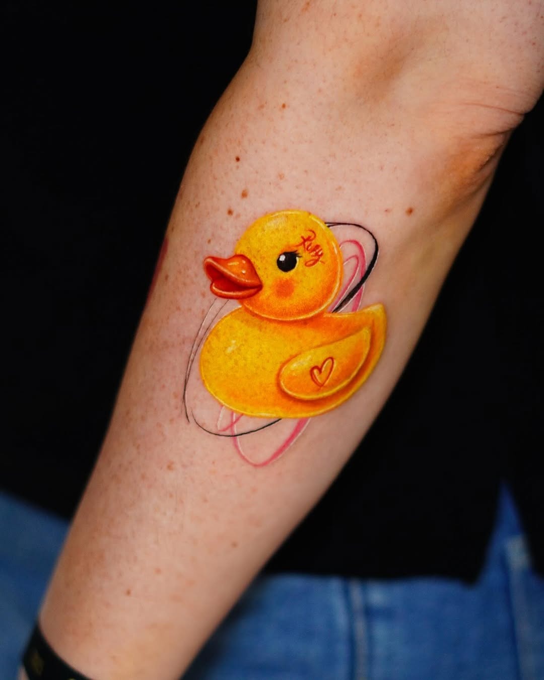 Bright and playful yellow duck tattoo design Tattoo Design