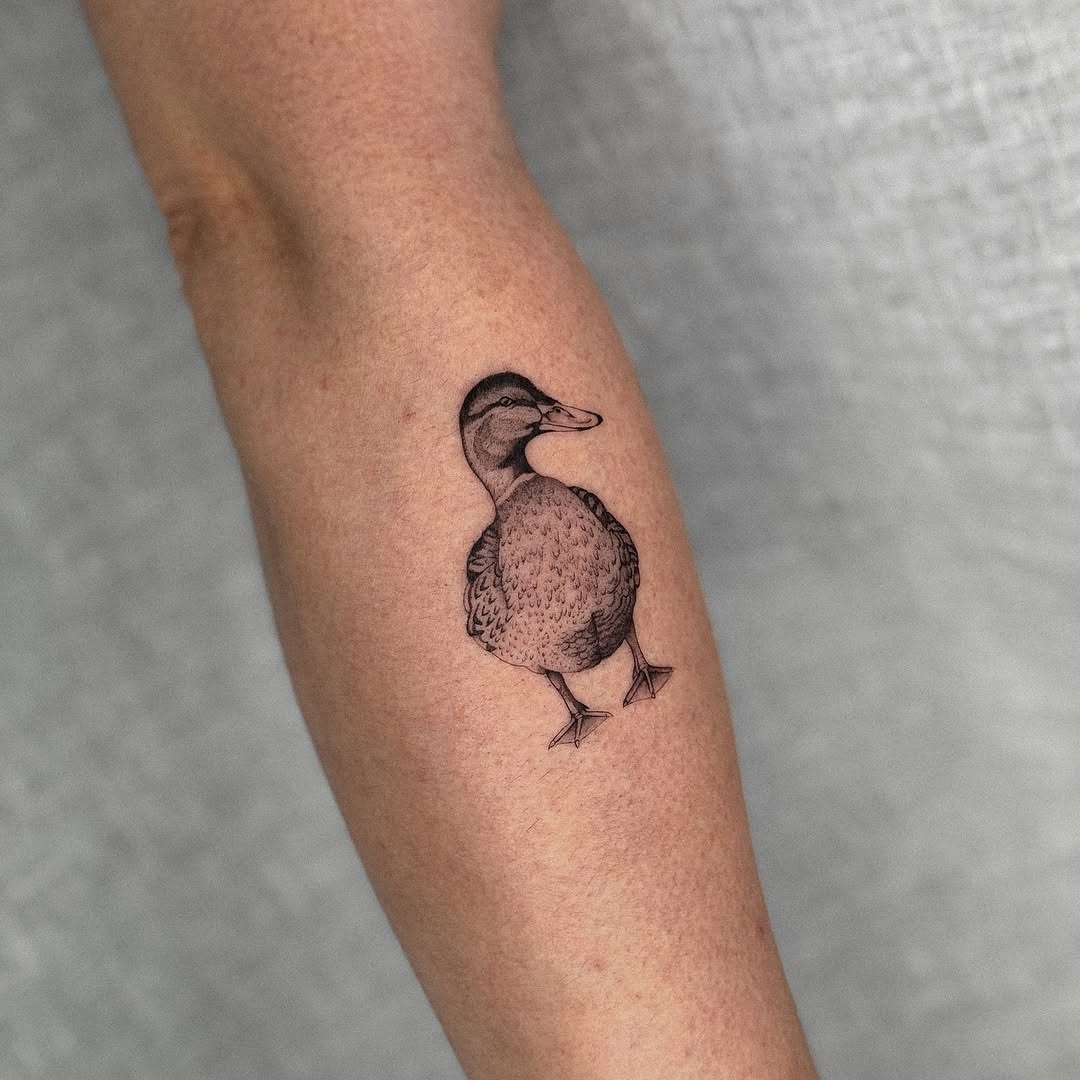 Charming duck tattoo on the forearm Tattoo Design