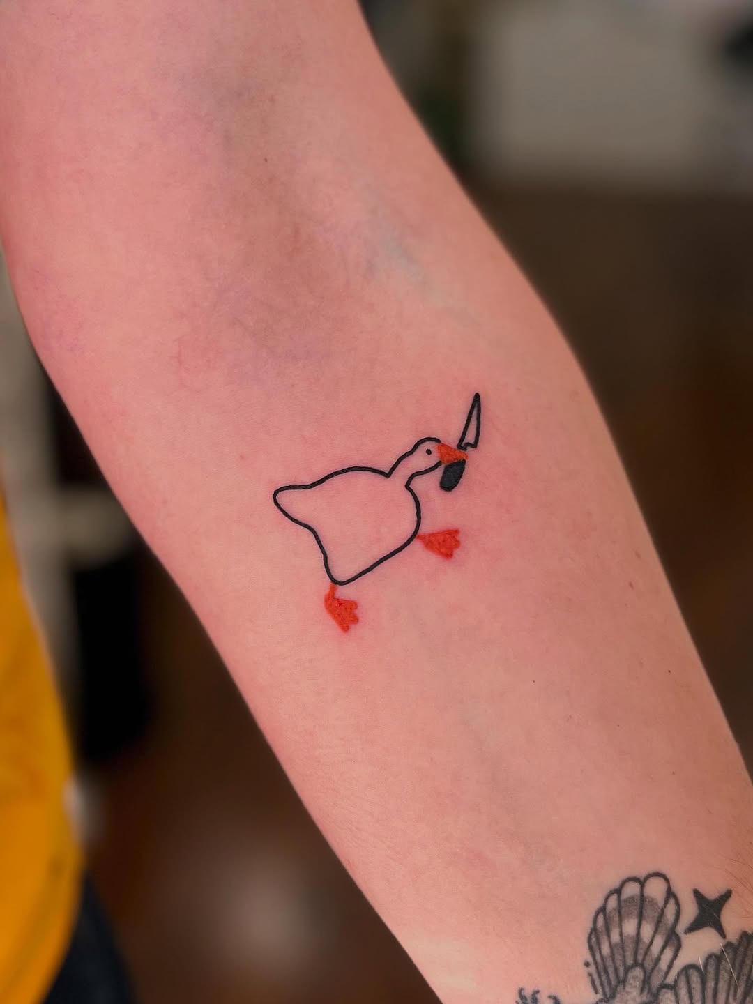 Charming minimalist duck tattoo design Tattoo Design