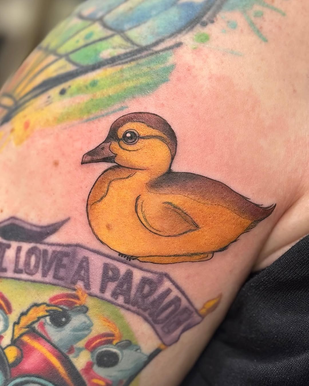 Charming yellow duck tattoo with artistic flair Tattoo Design